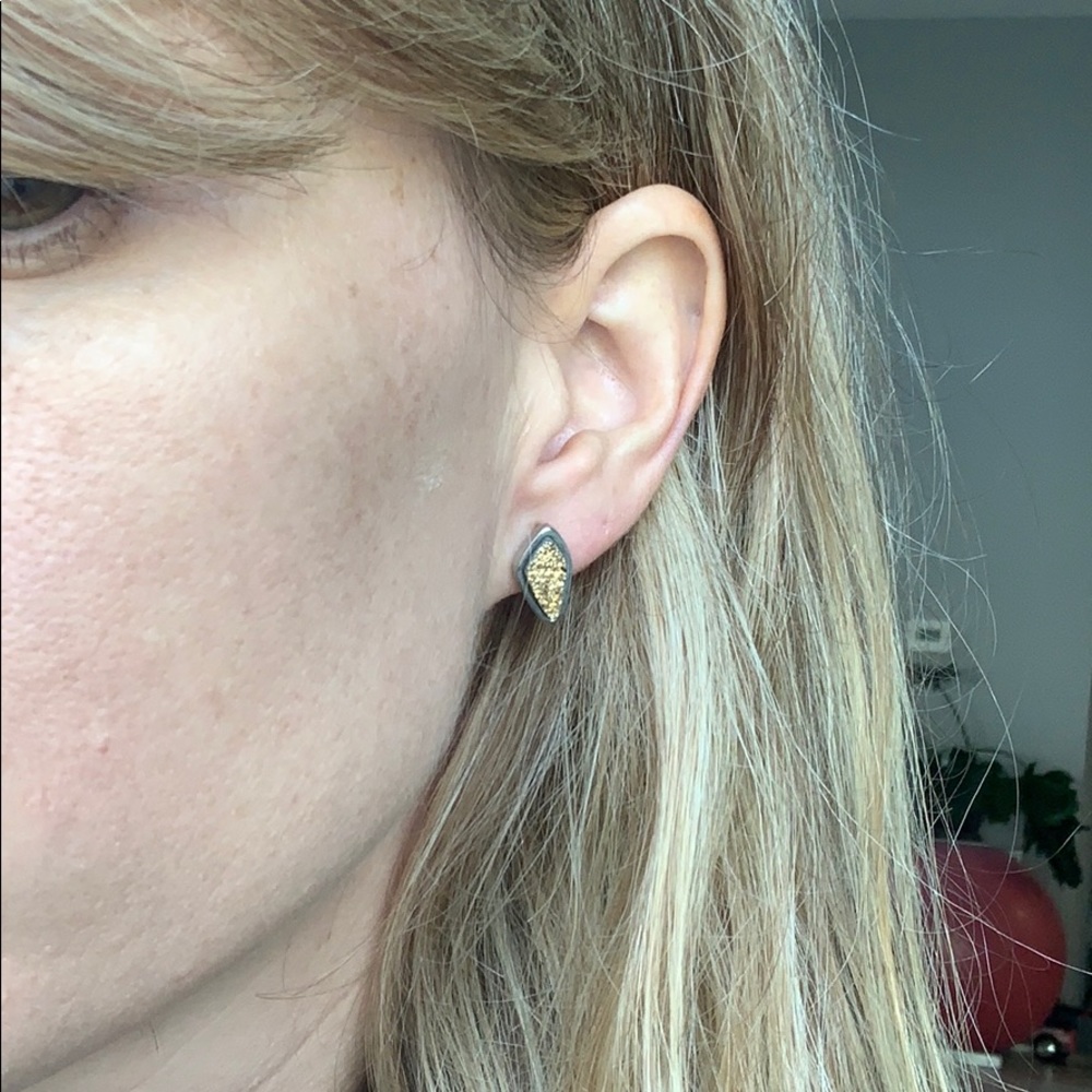 Silver and gold earrings, local designers